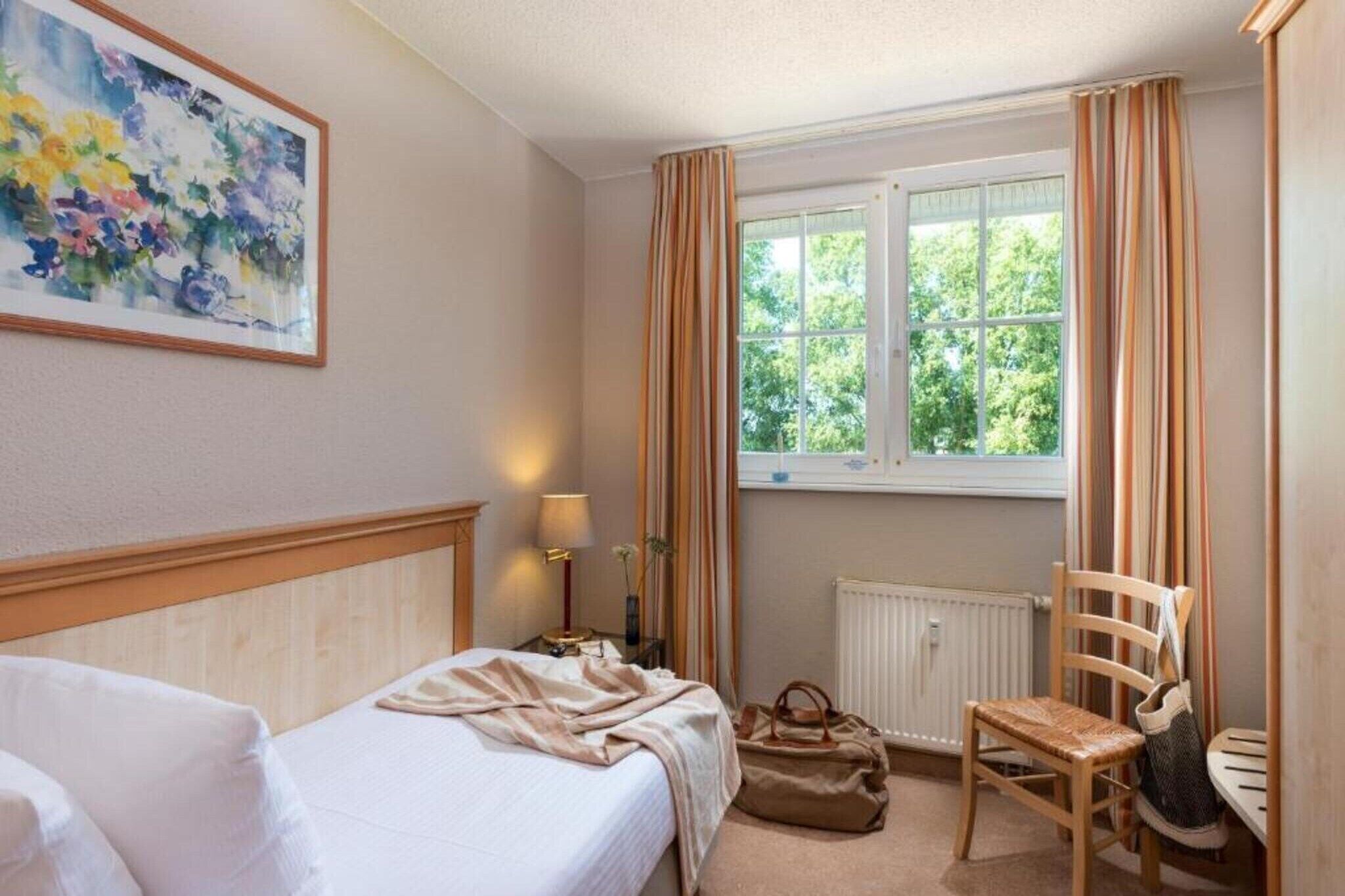 Escrivaninha, berço de viagem, Wi-Fi de cortesia