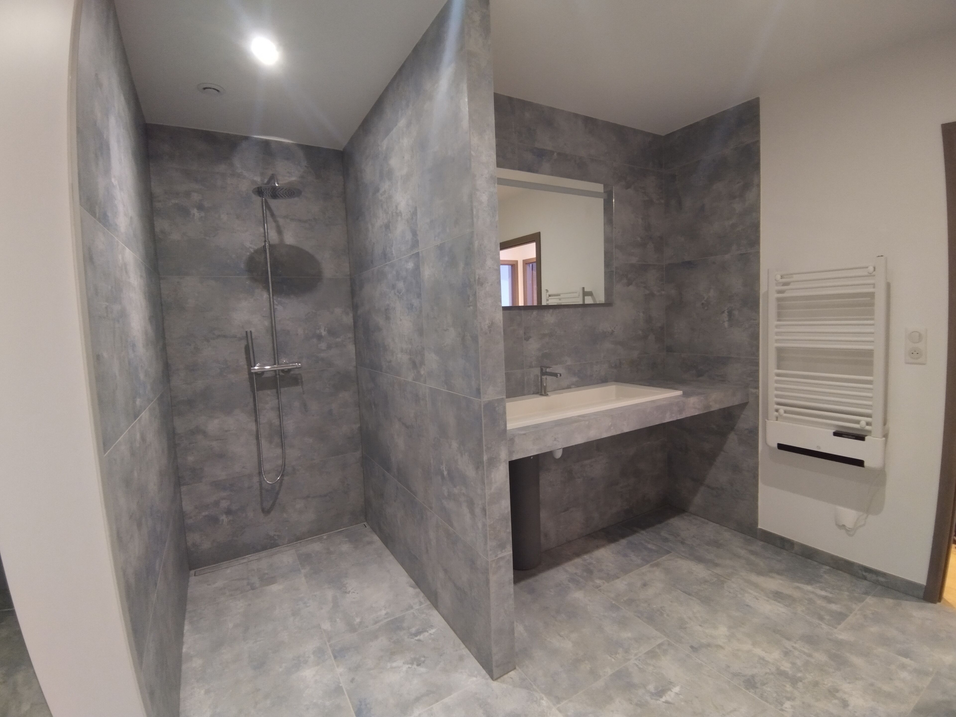 Shower, hair dryer, towels, toilet paper