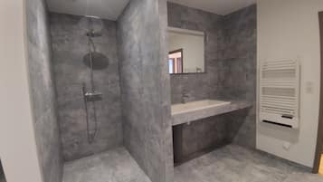 Shower, hair dryer, towels, toilet paper