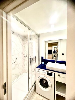 Hair dryer, towels, soap, toilet paper - Modern Sea-View Studio in Orbi City Batumi | Steps from the Beach (Batumi)