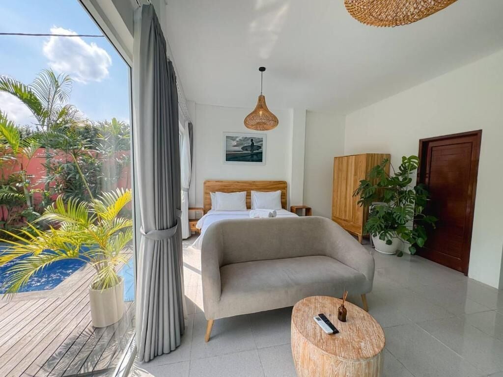 Deluxe Villa, 1 Bedroom, Pool View | In-room safe, blackout drapes, soundproofing, iron/ironing board