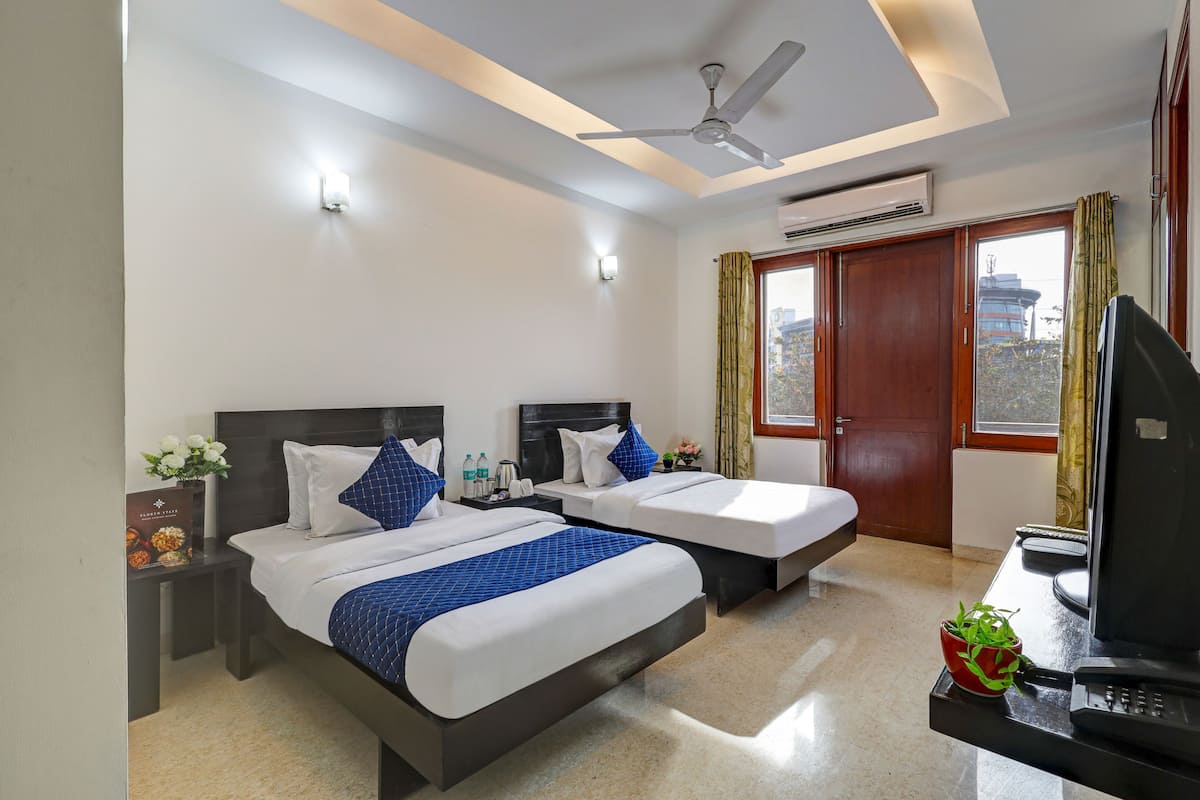 Twin Room, City View | Iron/ironing board, free WiFi