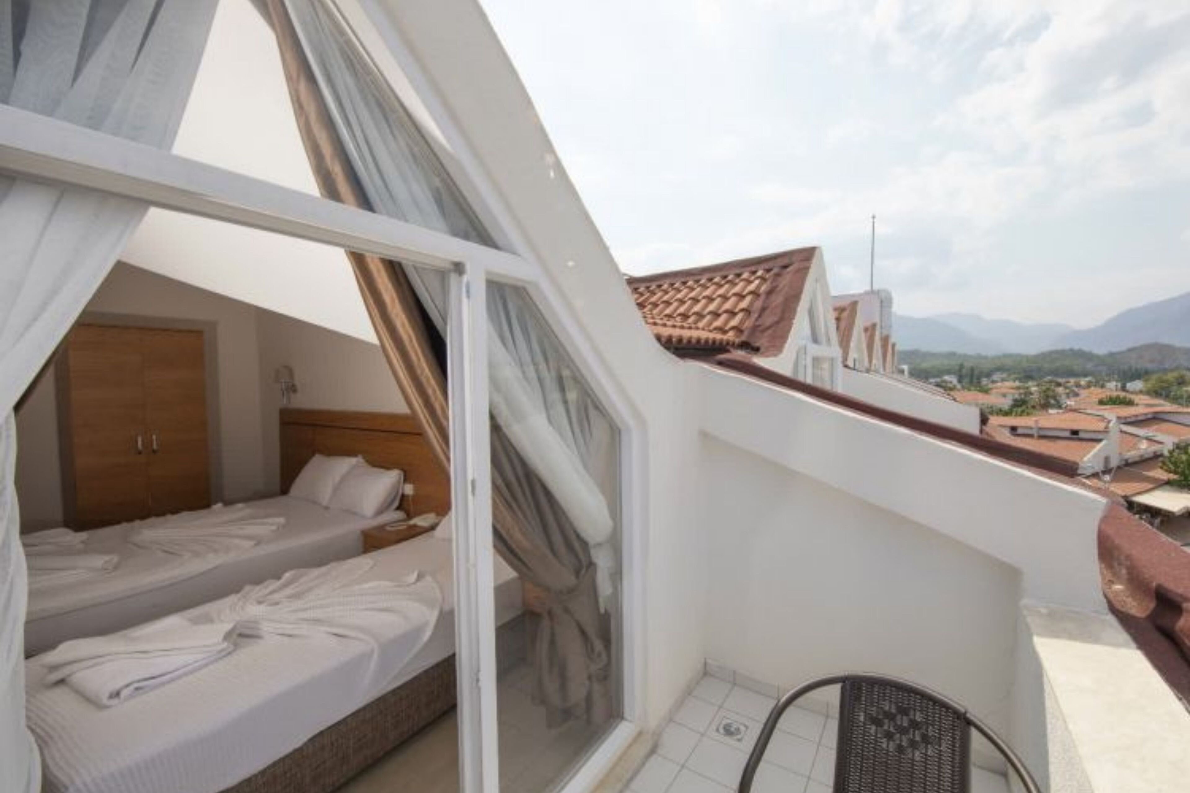 Standard Triple Room, Balcony | Premium bedding, minibar, in-room safe, laptop workspace