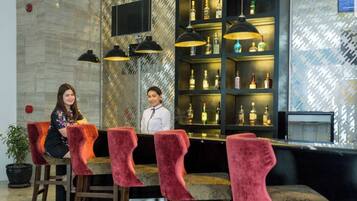 Apartment, 1 Bedroom | Bar (on property)