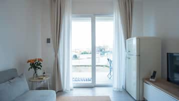 Apartment, Poolblick | Wohnbereich