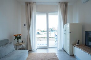 Apartment, Pool View | Living area - Casa De Capua (Lu Bagnu)