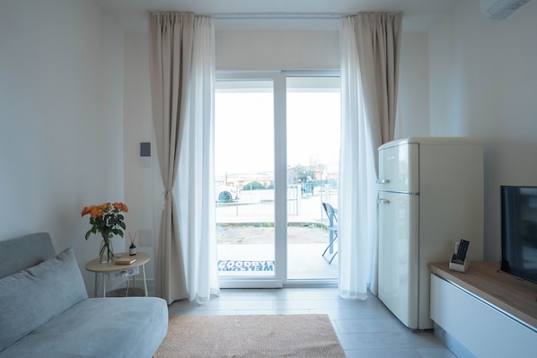 Apartment, Pool View | Living area - Casa De Capua (Lu Bagnu)