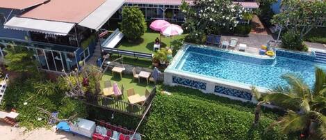 Outdoor pool, open 6:00 AM to 10:30 PM, sun loungers