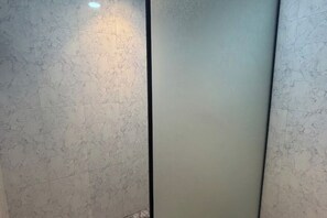 Shower, hair dryer, towels, soap - Cozy Yard | Modern Minimal Studio Near Spectrum Mall & Metro 🌿 (Noida)