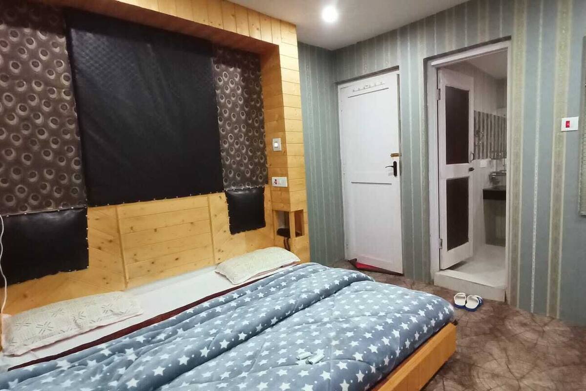 Habitación Deluxe con 1 cama matrimonial o 2 individuales, vista a la ciudad | Wifi gratis