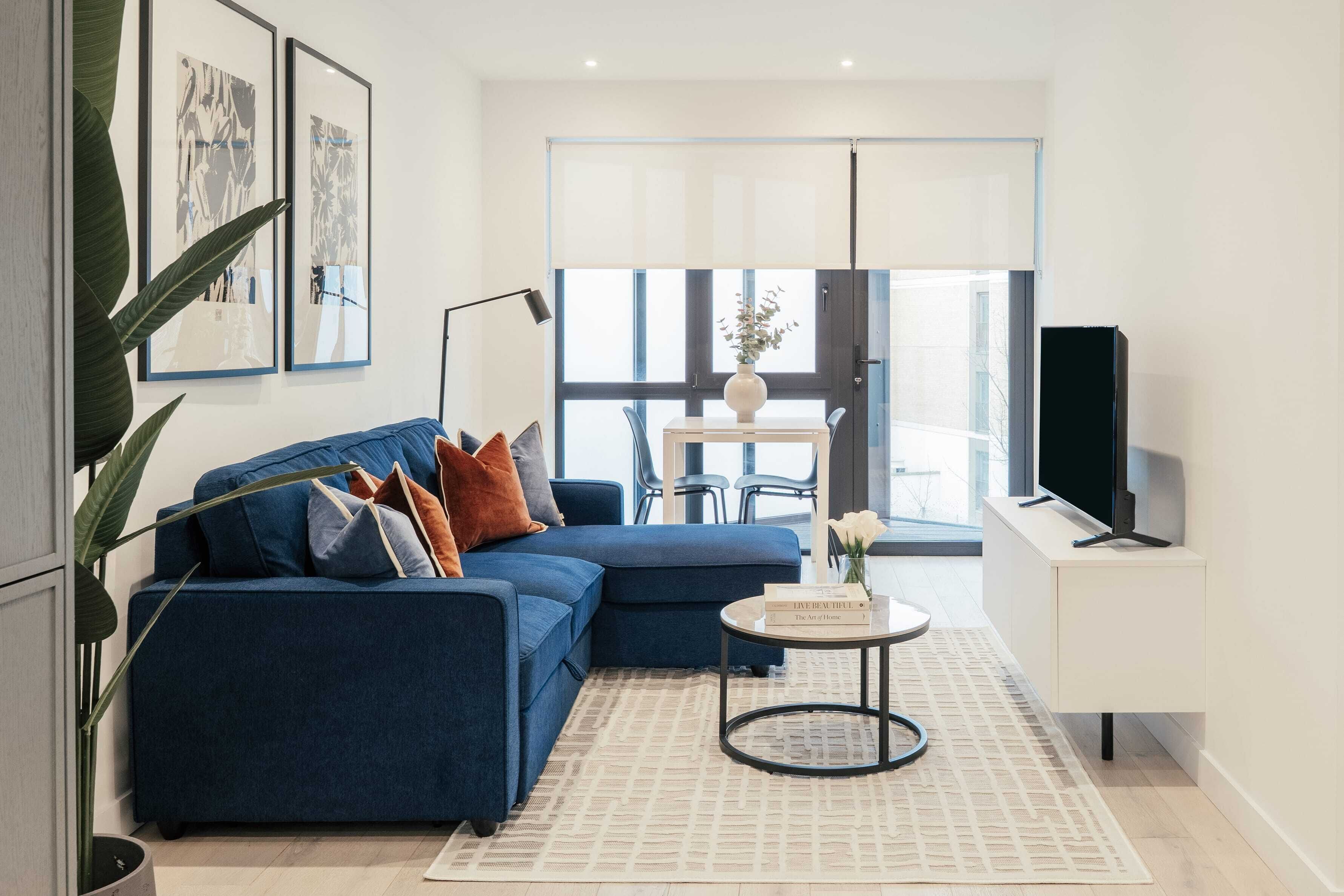 Apartment, 1 Bedroom, Balcony | Living area | Flat-screen TV