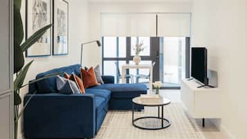 Apartment, 1 Bedroom, Balcony | Living area | Flat-screen TV