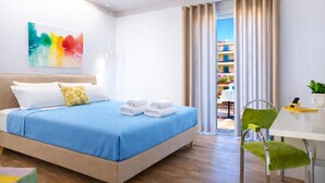 Familiesuite, privat bad, byutsikt | Sengetøy av topp kvalitet, dundyner og memory foam-senger