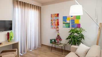 Familien-Suite, eigenes Bad, Stadtblick | Wohnbereich