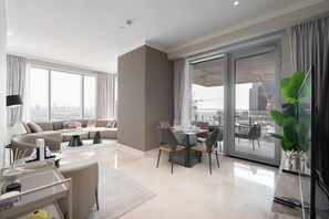Deluxe Apartment, City View | Living area | Smart TV - 2 Bed TAJ Residences - JLT Metro (Dubai)