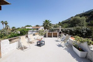 Superior appartement, uitzicht op zee | Terras