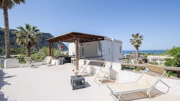 Superior appartement, uitzicht op zee | Terras