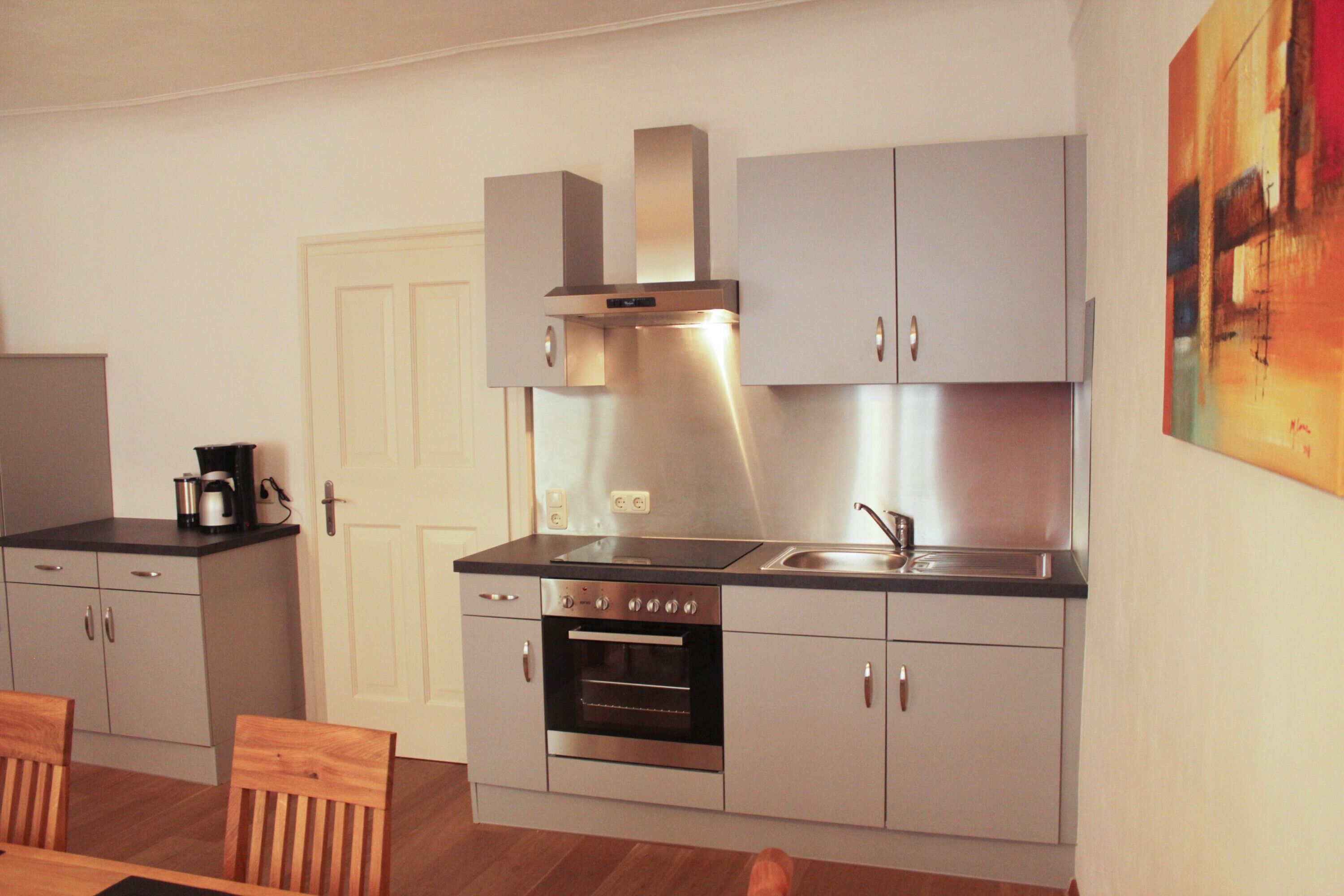 Fridge, oven, stovetop, coffee/tea maker