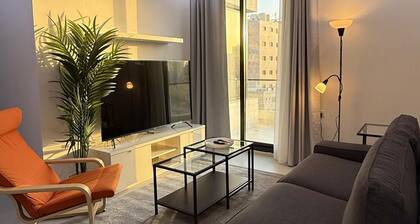 Cozy 2-bedroom apartment in charming Salmiya with AC and gym access