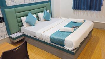 Deluxe Double Room, City View | Desk, laptop workspace, iron/ironing board, free WiFi