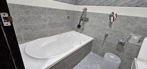 Deluxe Double Room, City View | Bathroom - Hotel Radiyesan Gold (Surat)