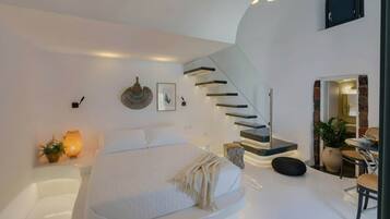 Tabla de planchar con plancha, wifi y ropa de cama