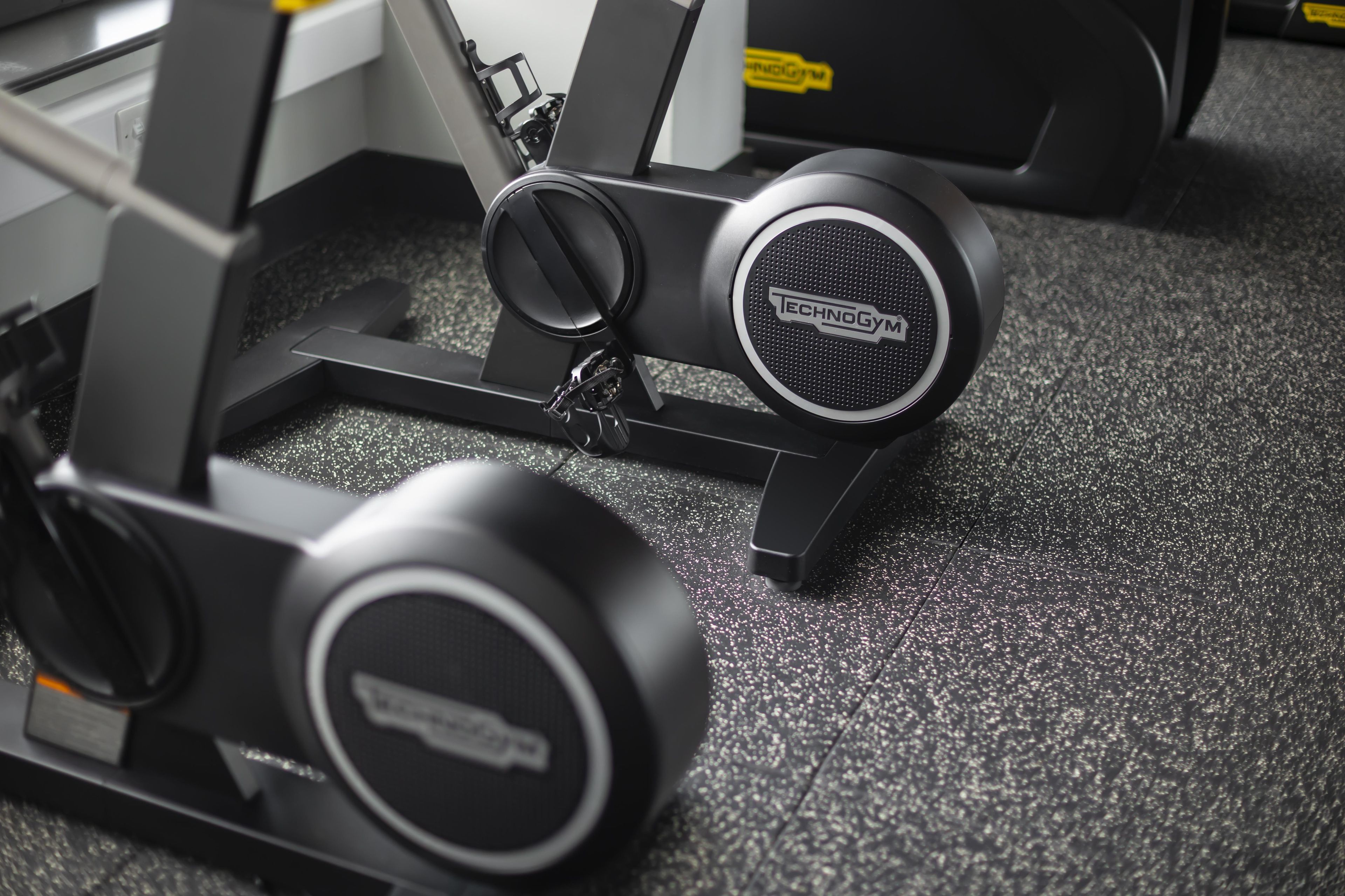 A piece of exercise equipment with a label that reads 'TECHNOGYM'.