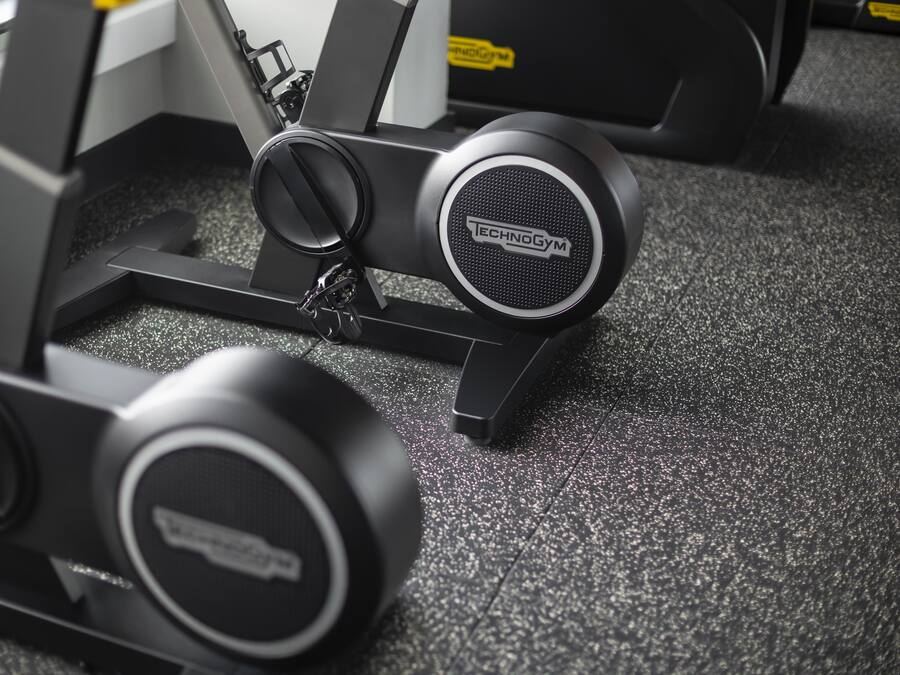 A piece of exercise equipment with a label that reads 'TECHNOGYM'.