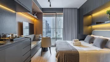 Departamento superior, 1 cama Queen size, aire acondicionado, vista a la ciudad | Ropa de cama de alta calidad, wifi gratis y ropa de cama