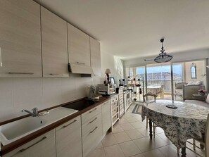 Fridge, microwave, oven, stovetop - 2-room apartment with loggia and parking in Calvi (Calvi)