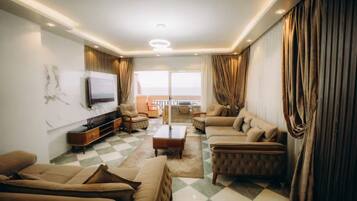 Appartement Confort, 3 chambres, vue mer, en front de plage | Coin séjour