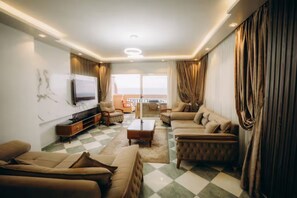Comfort Apartment, 3 Bedrooms, Sea View, Beachfront | Living area - seaview hotel (Alexandria)
