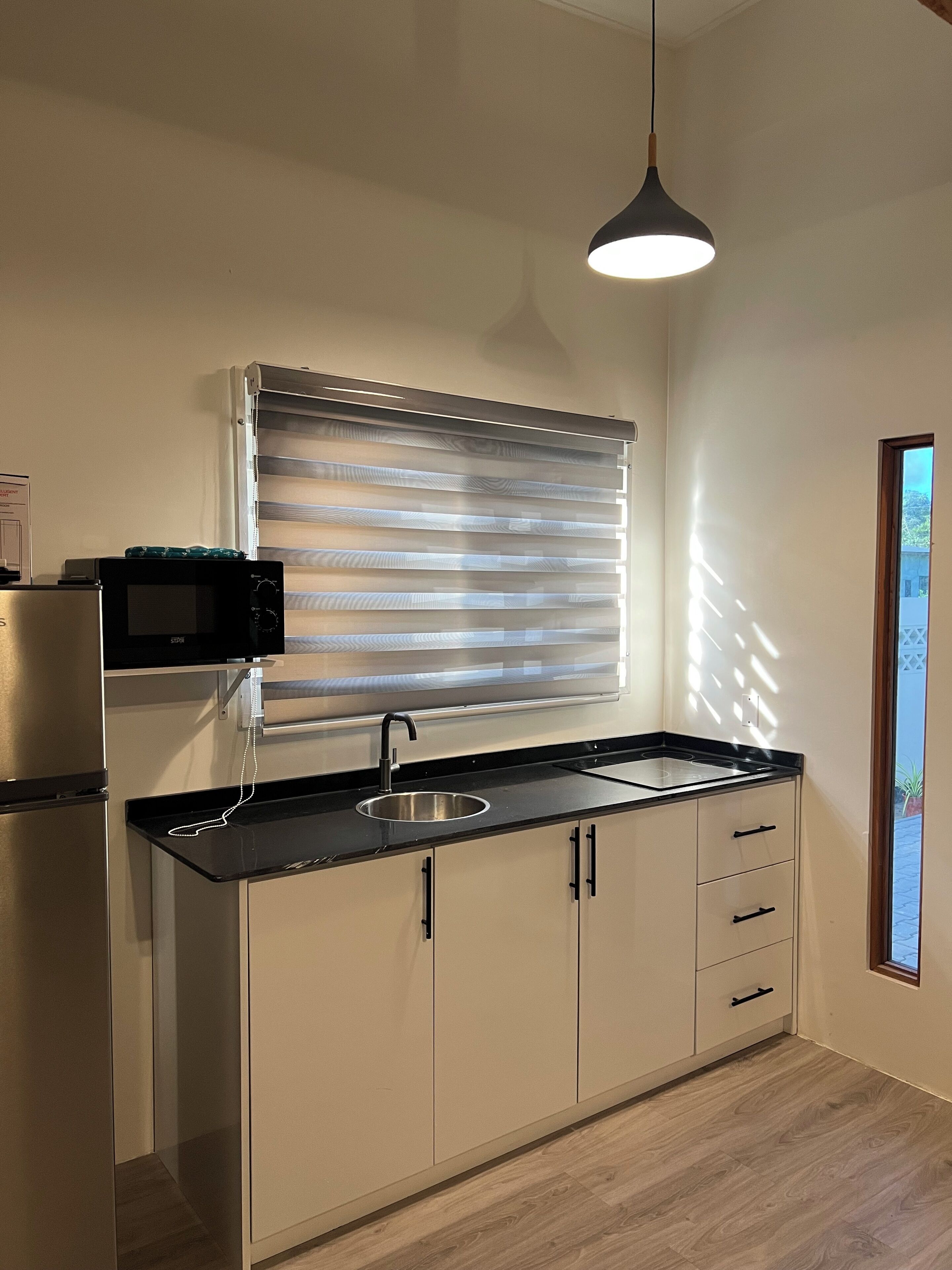 Apartamento conforto, sacada, vista para o jardim | Cozinha privada