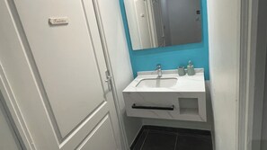 Hair dryer, bidet, towels, soap