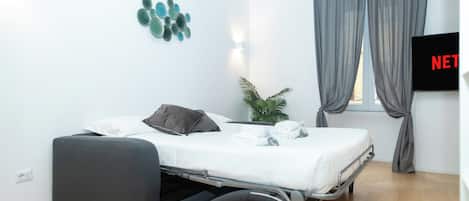 Blackout drapes, soundproofing, iron/ironing board, free WiFi