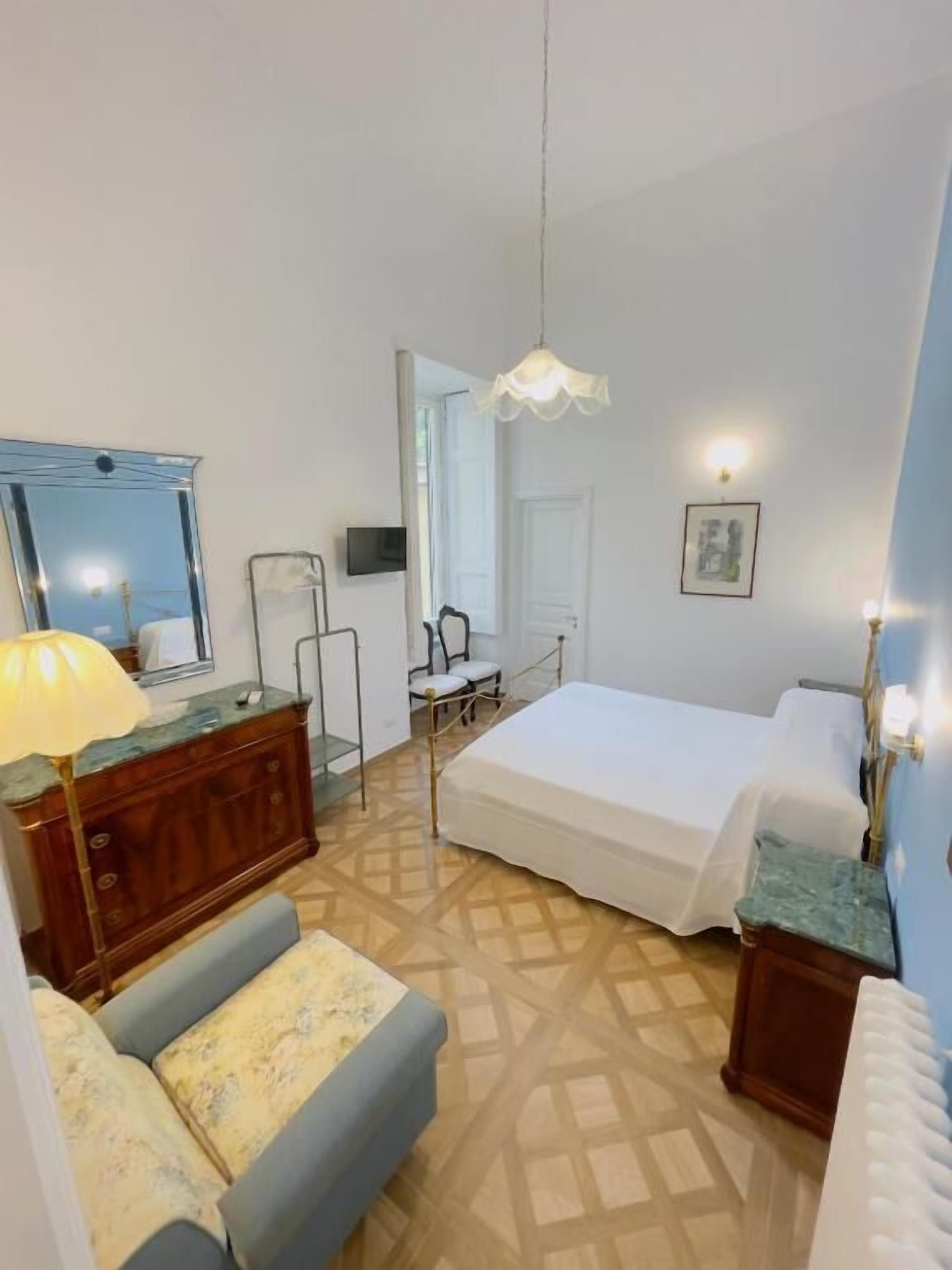 Deluxe Double Room, Courtyard View | Blackout drapes, free WiFi