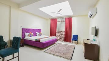 Suite, Balcony, City View | In-room safe, soundproofing, iron/ironing board, free WiFi