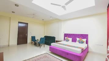 Suite, Balcony, City View | In-room safe, soundproofing, iron/ironing board, free WiFi