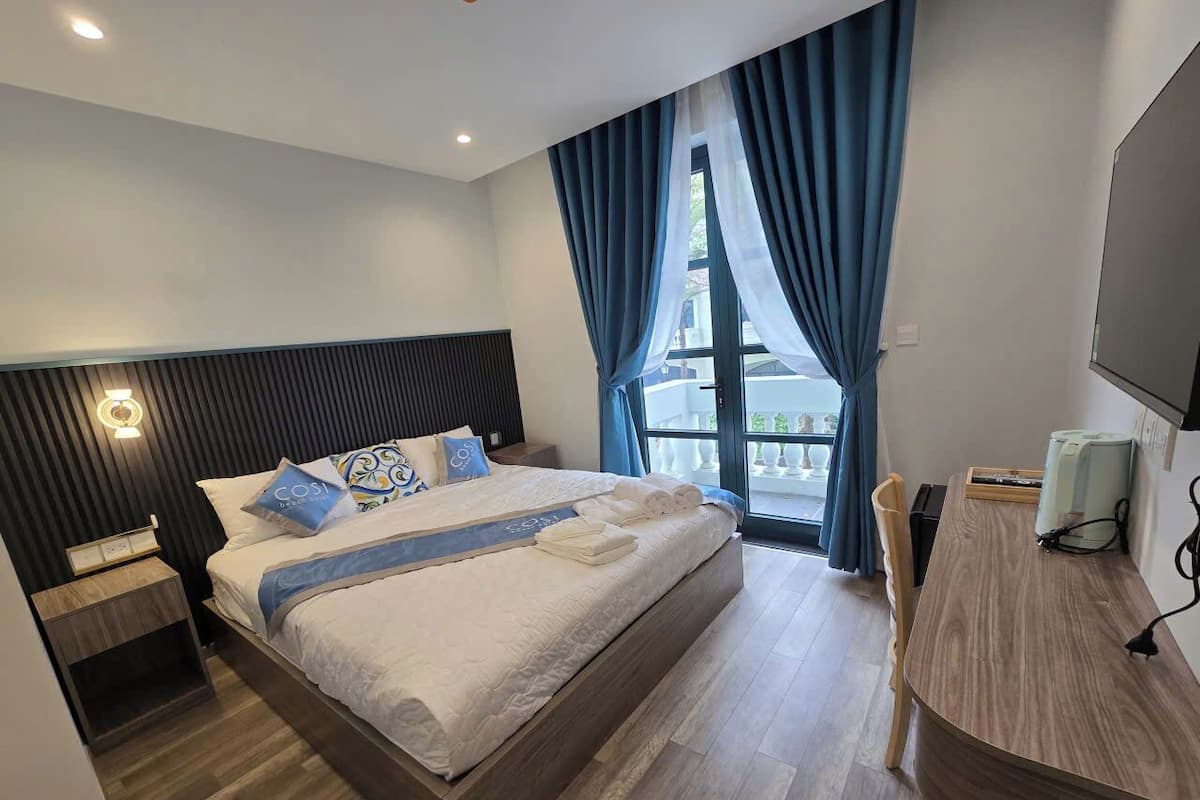 Deluxe Double Room, Balcony, City View | Blackout drapes, soundproofing, free WiFi
