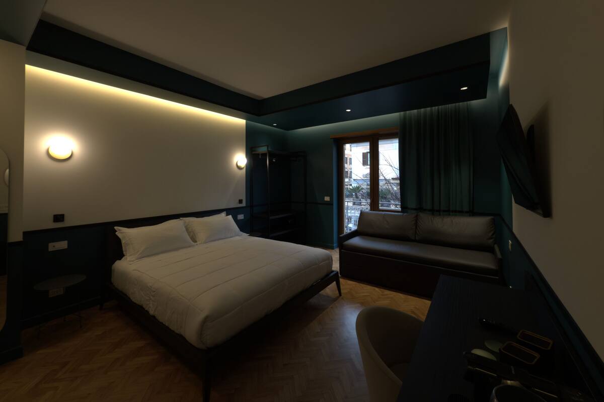 Deluxe Quadruple Room, Private Bathroom, City View