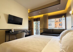 Deluxe Quadruple Room, Private Bathroom, City View | Free minibar, in-room safe, individually decorated - Vatican Domus Stefania Guest House (Rome)