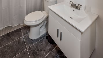 Apartment, 1 Queen Bed with Sofa bed | Bathroom | Shower, towels, soap, shampoo