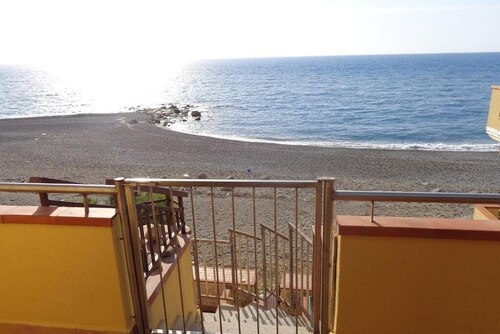 Beachfront penthouse with panoramic terrace and direct beach access