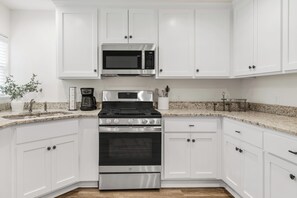 Fridge, microwave, oven, stovetop - Newly Renovated 3 bedroom home near Texas A&M (Bryan)