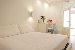 Superior Room, Balcony | Down comforters, pillowtop beds, free minibar items, laptop workspace - Emma's downtown Eco design rooms (Olbia)