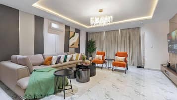 Appartement Ăconomique, balcon, vue ville | Coin sĂ©jour