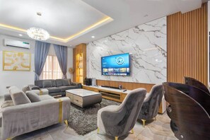 Economy Apartment, Balcony, City View | Living area - Olive Apartment (Abuja)