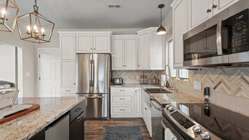 House, Multiple Beds, Patio (Mimosa Mornings) | Private kitchen
