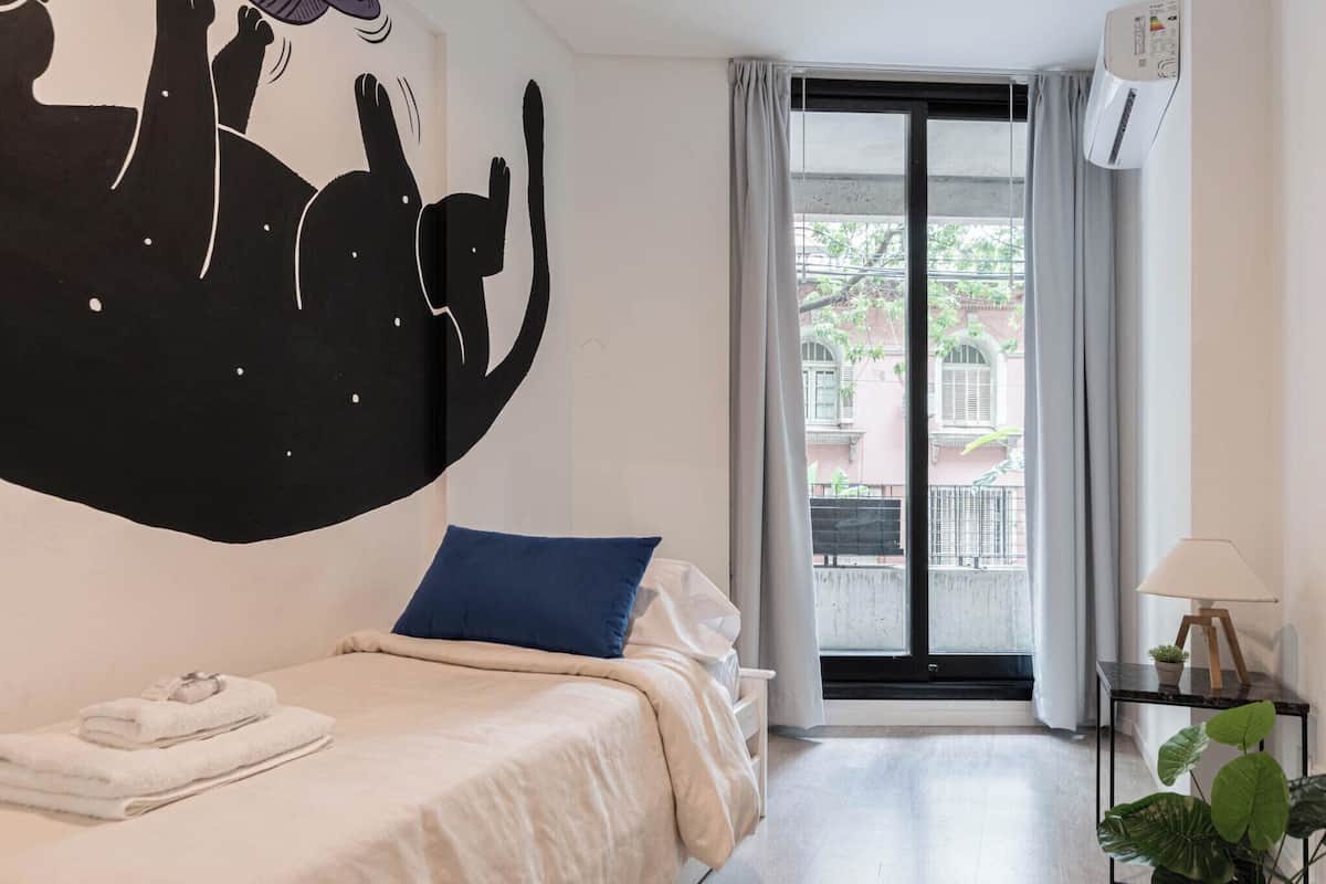 Family Apartment, City View | Desk, laptop workspace, iron/ironing board, free WiFi