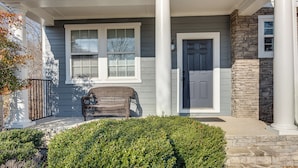 A house with a porch, a door, and a window. - Great for Gatherings! Elegant Atlanta Retreat (Atlanta)